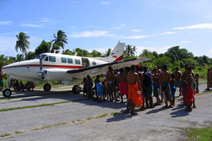 Yap_Woleai_PMA_Aircraft_Villagers